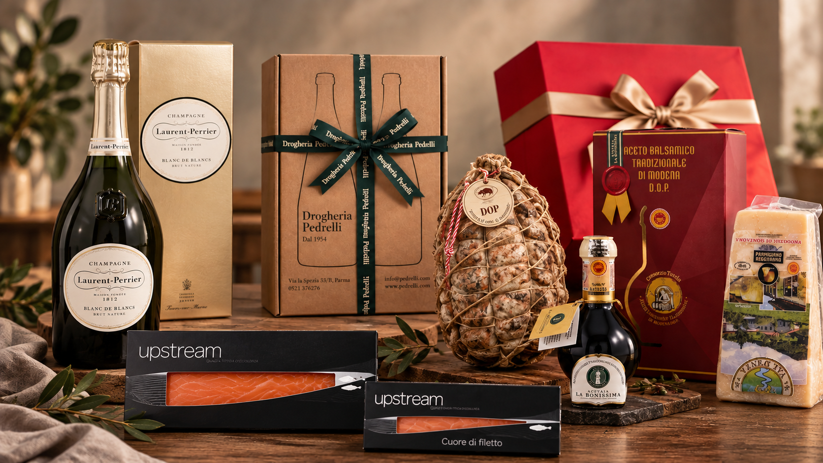 Idee regalo enogastronomiche, con vino Champagne, aceto, Culatello, Parmigiano Reggiano e Salmone
